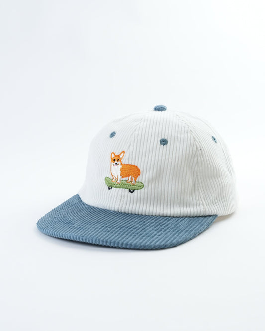 Kids striped baseball cap with orange dog on skateboard patch and blue speckled accents