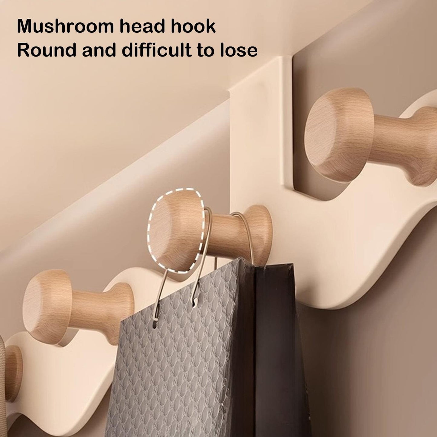 White coat rack with rounded wooden hooks for hanging bags and accessories