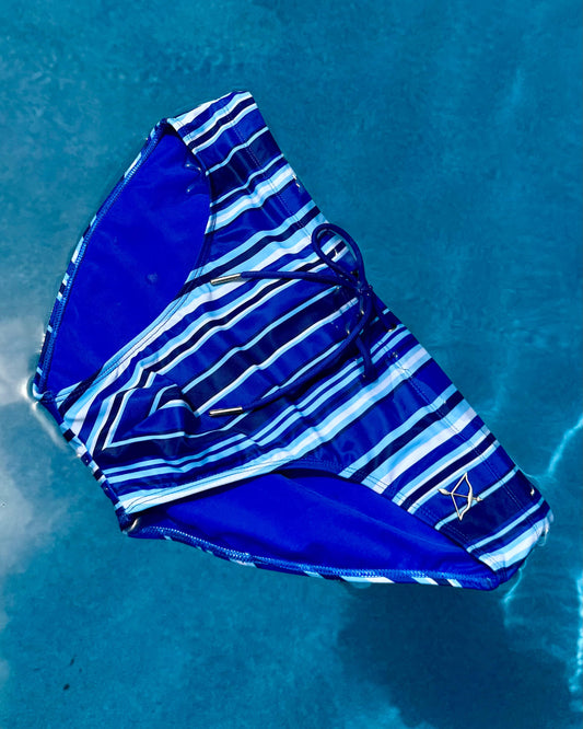 Blue striped swim brief laid flat, showing side/back cut and drawstring ties