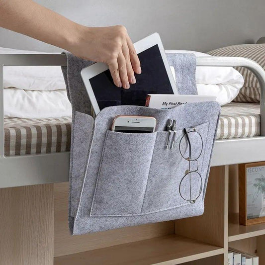 Dark gray felt storage bag pouch holding tablet and phone in front pocket