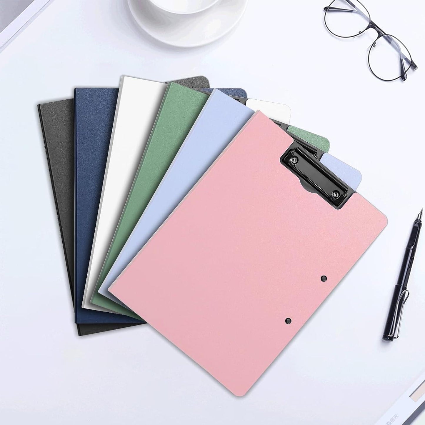 Set of vertical letter folders with metal clip, in pink, blue, green, and dark tones