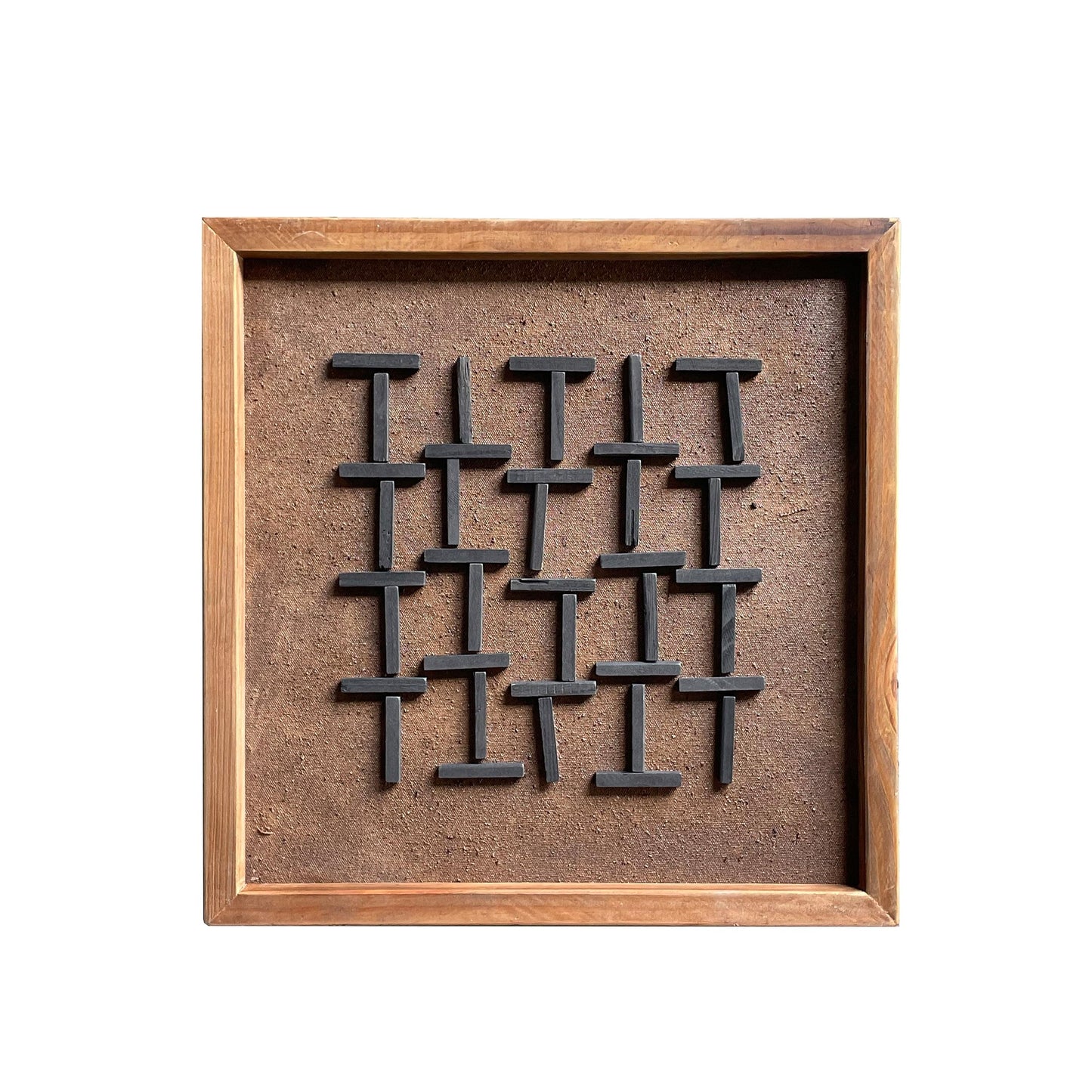 Framed wall art square with tan backing and black nail cross cluster in wooden border