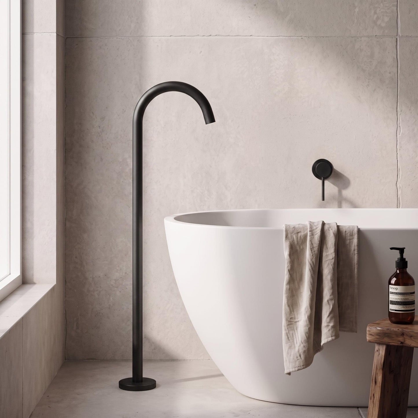 Matt black curved spout mixer tap with tall vertical stem