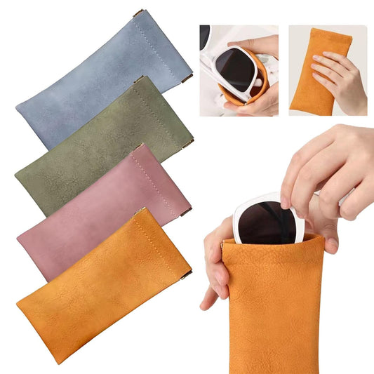 Soft eyeglass case pouch in orange, shown in hand with multicolor pouches.