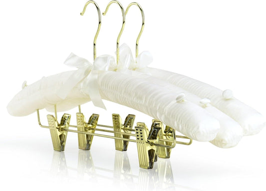 Ivory satin padded hangers with clips and bows, gold-toned frame