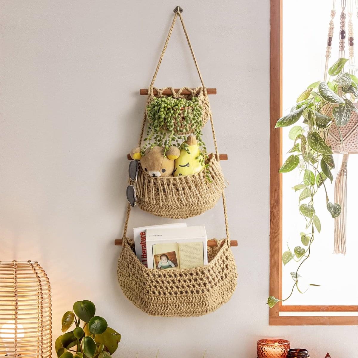 3-tier woven jute hanging basket with green top pouch and two lower storage compartments