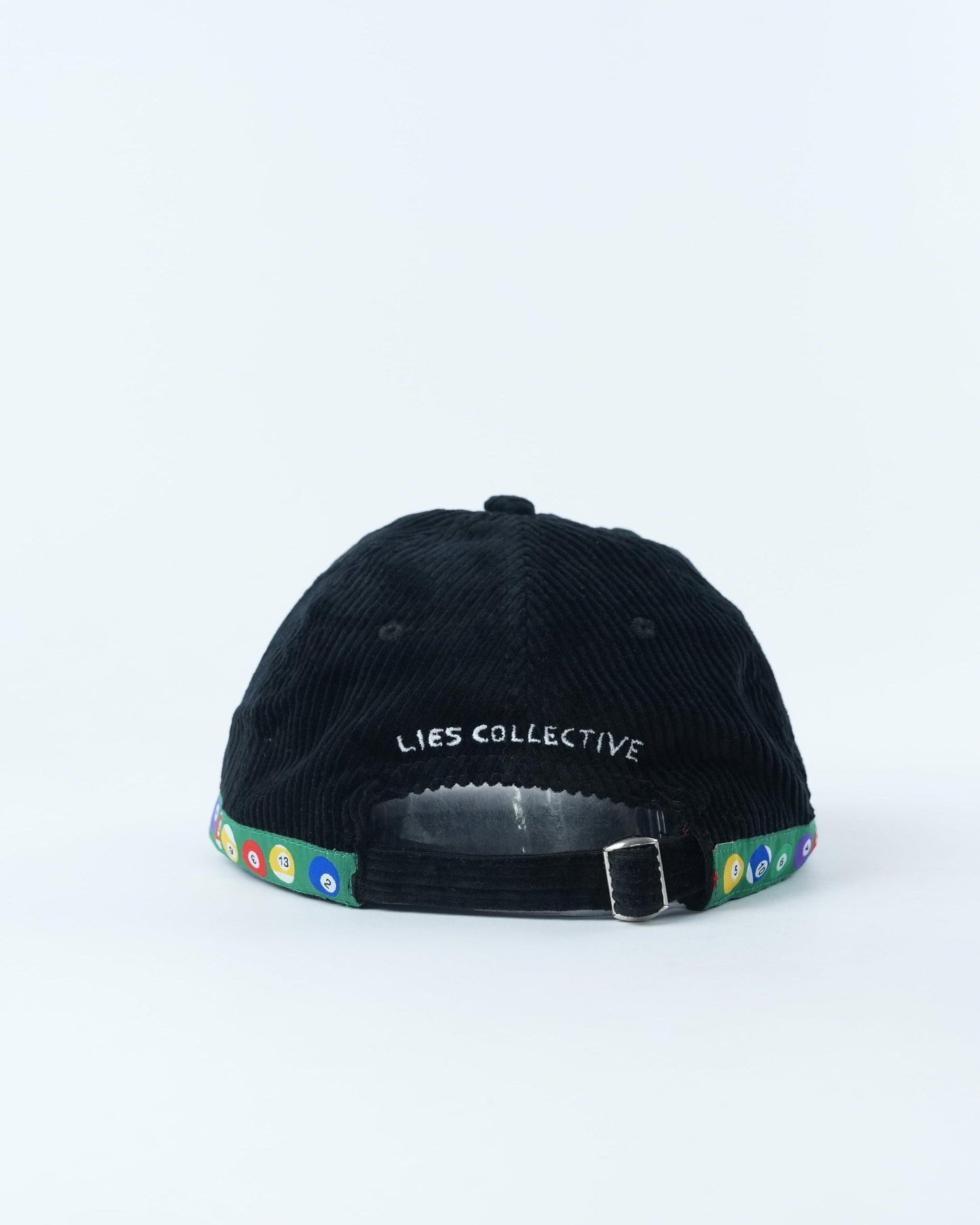 Black corduroy baseball cap with "LIES COLLECTIVE" label and multicolor trim