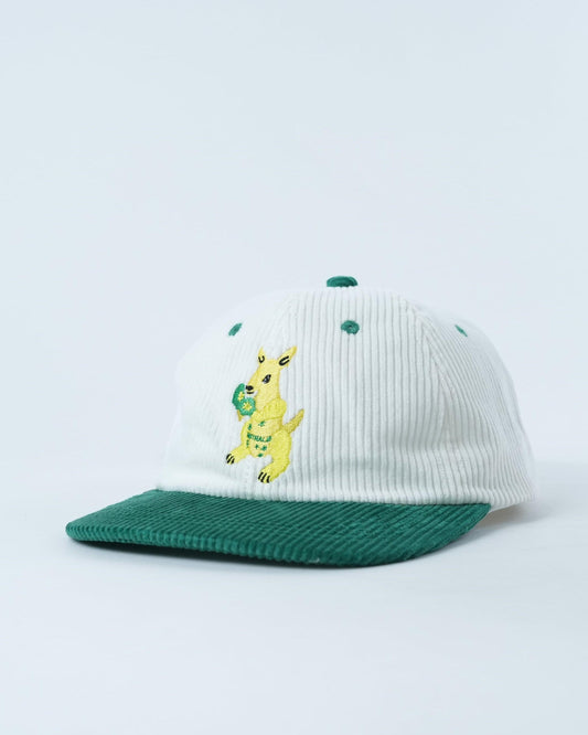 White ribbed kids cap with green brim and side embroidery of yellow bunny