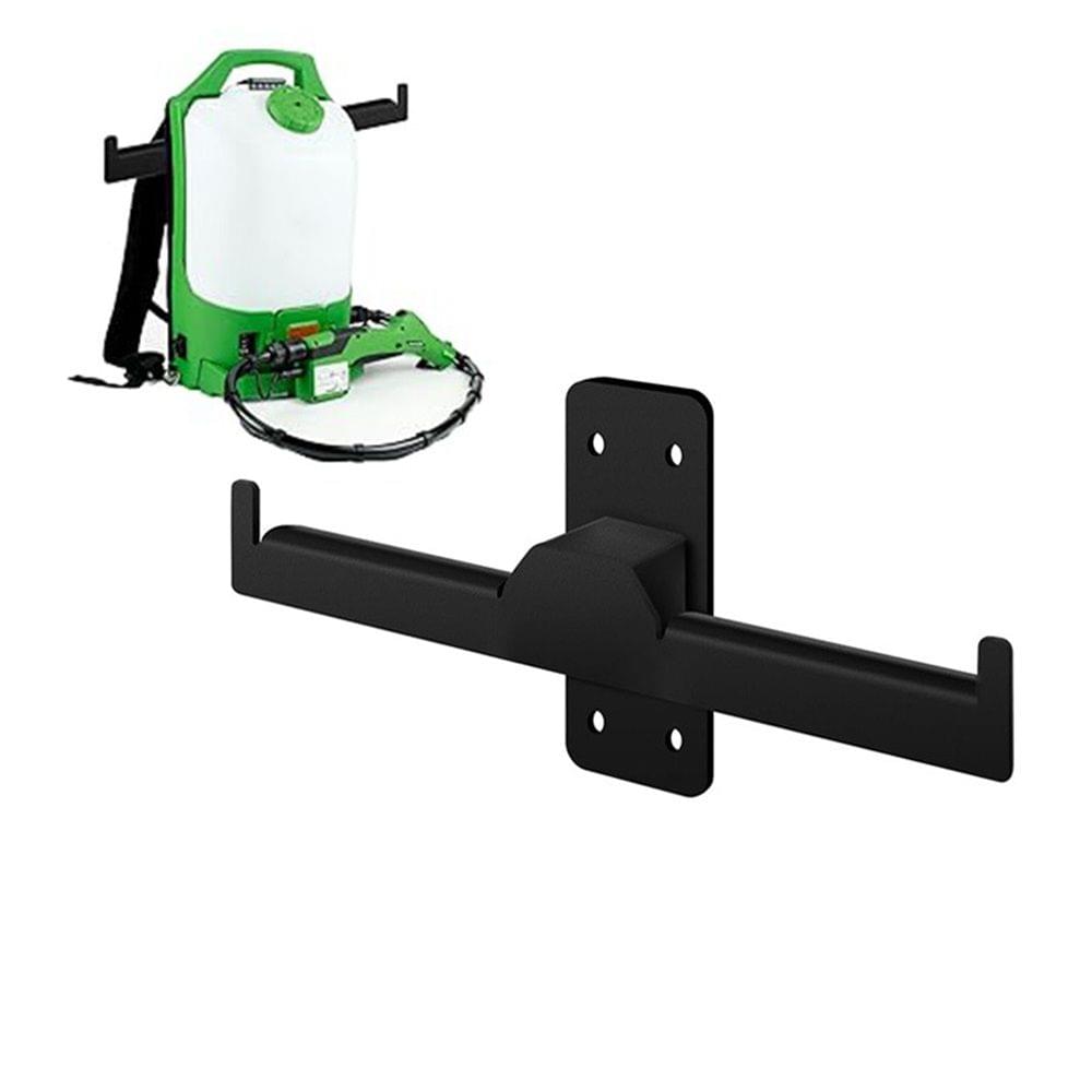 Black wall-mounted hanger bracket supporting a backpack sprayer on its arms