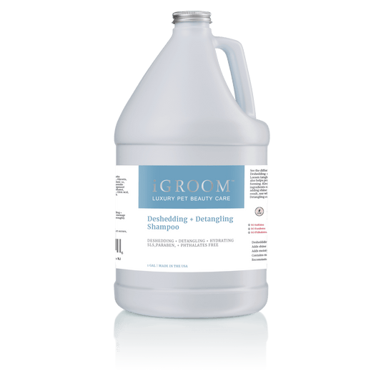iGROOM Deshedding + Detangling Shampoo bottle, white jug shape with silver lid.