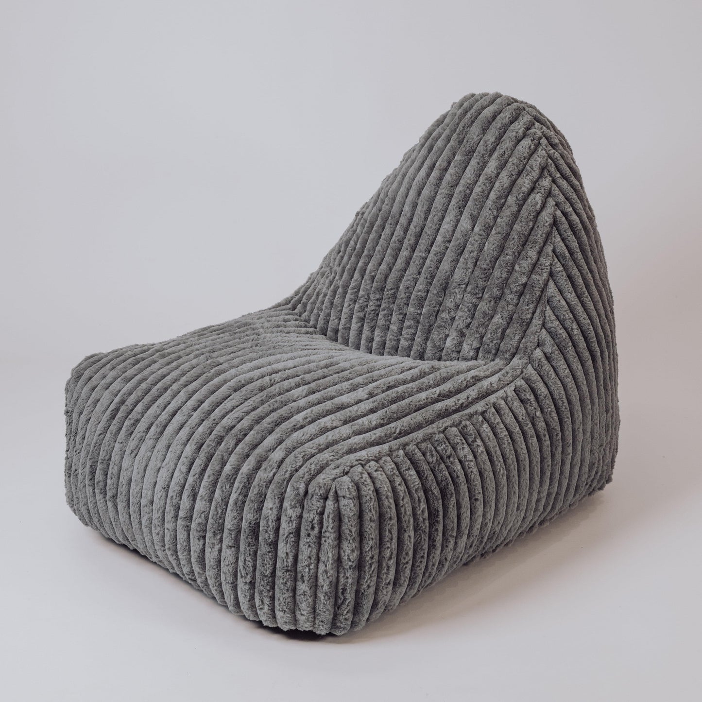 Slate corduroy-style beanbag chair with ribbed texture and rounded wedge seat