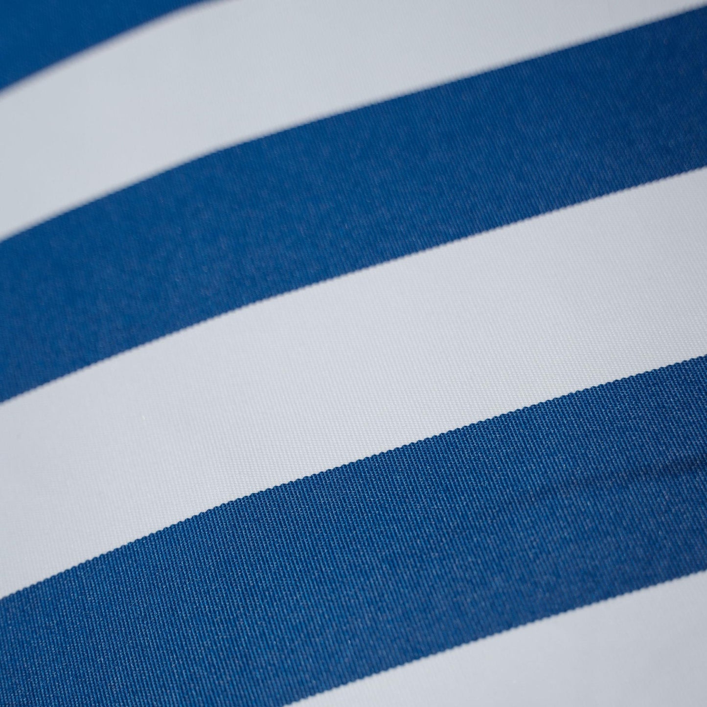 Close-up of ocean blue and white striped outdoor fabric