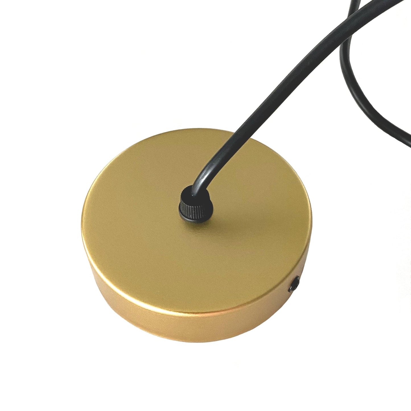 Gold ceiling canopy for pendant light with black cord connection