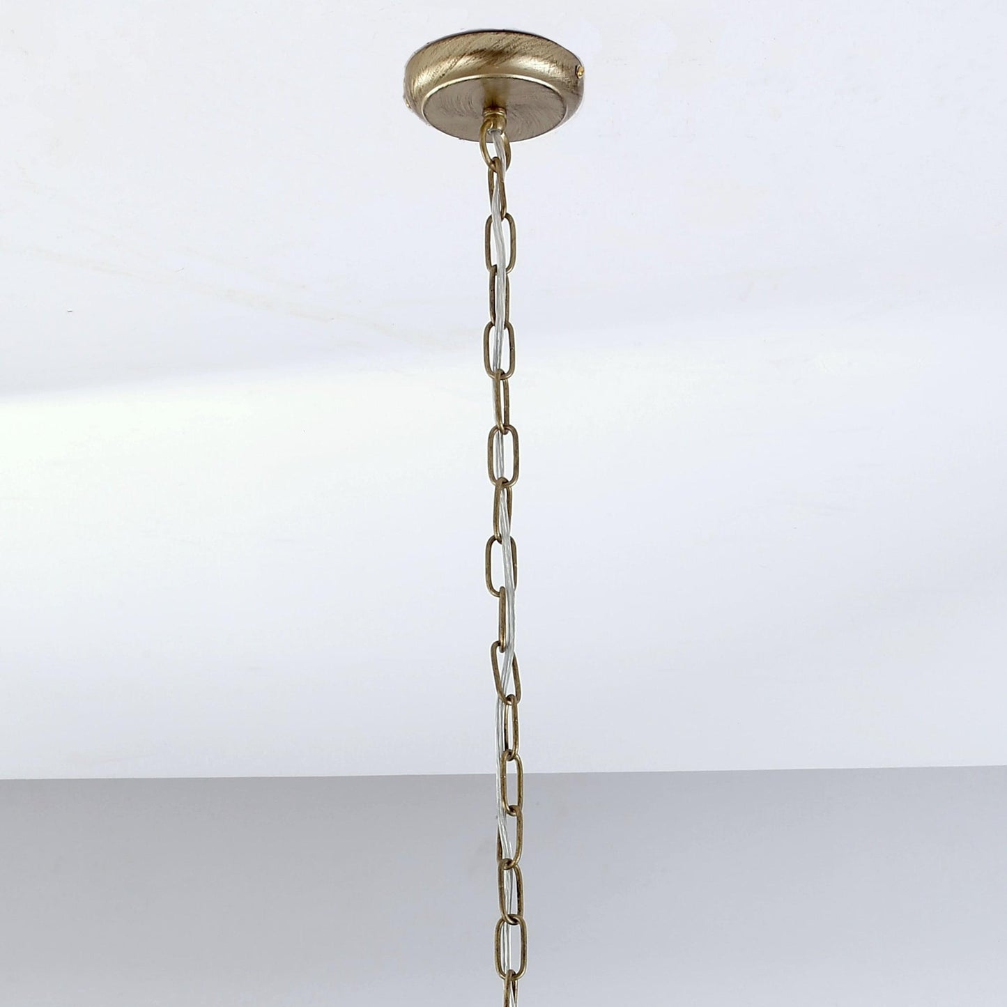 Brushed gold pendant light chain with round ceiling canopy