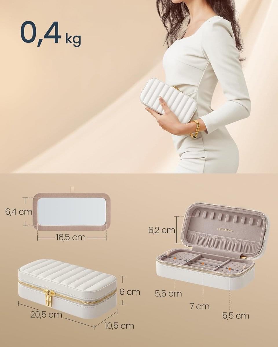 White quilted jewelry box with gold-tone zipper; compact storage organizer.