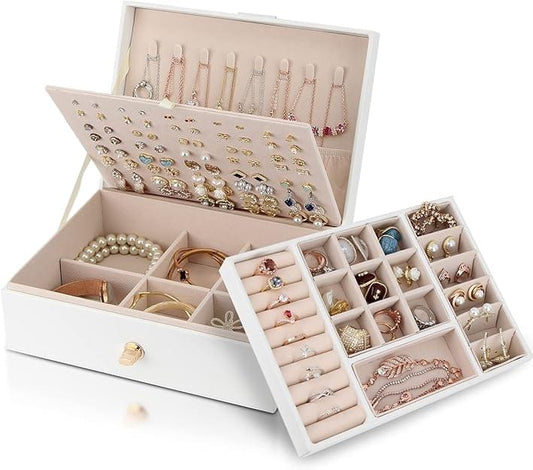 White jewelry box organizer with open lid and stacked inserts for earrings and rings
