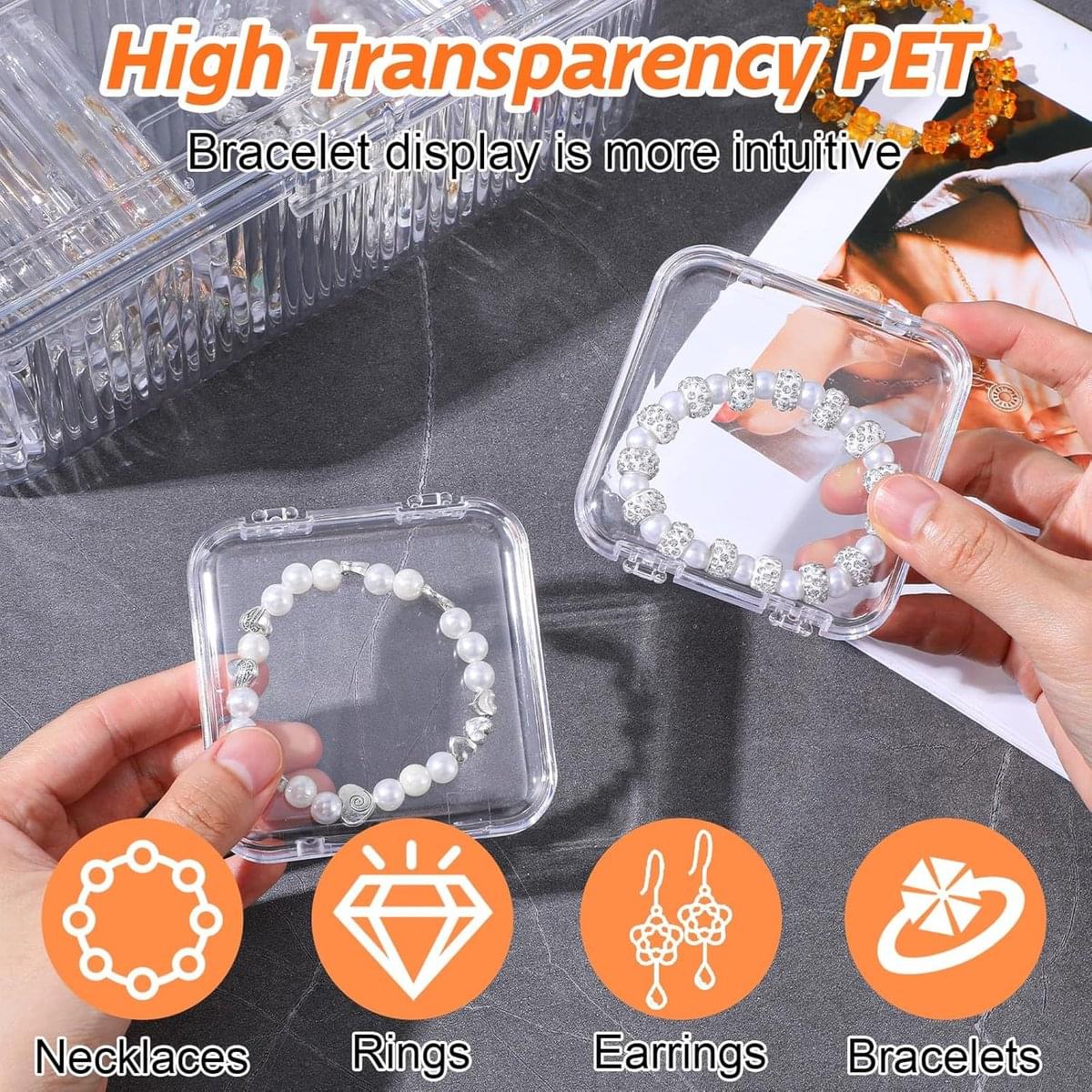 Transparent jewelry organizer case with open compartments holding a bracelet display