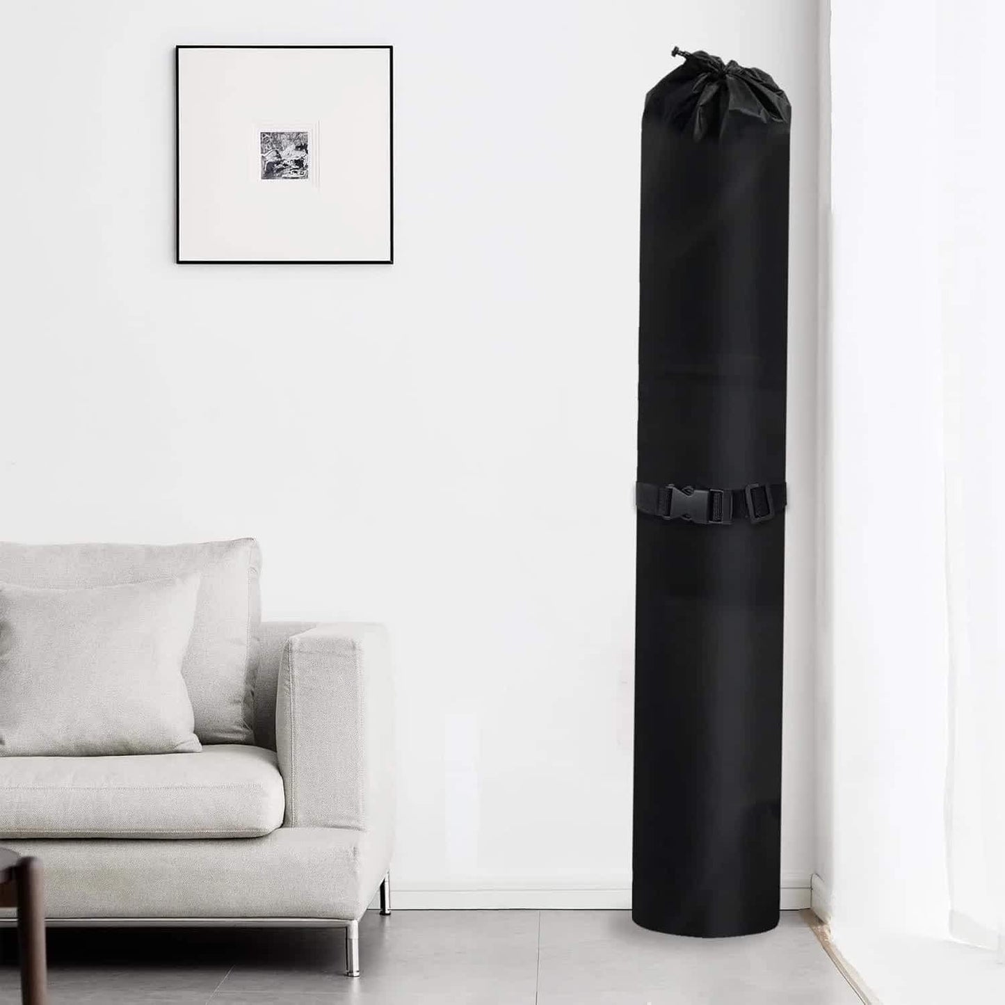 Black tall rug storage bag with drawstring top and buckle strap closure