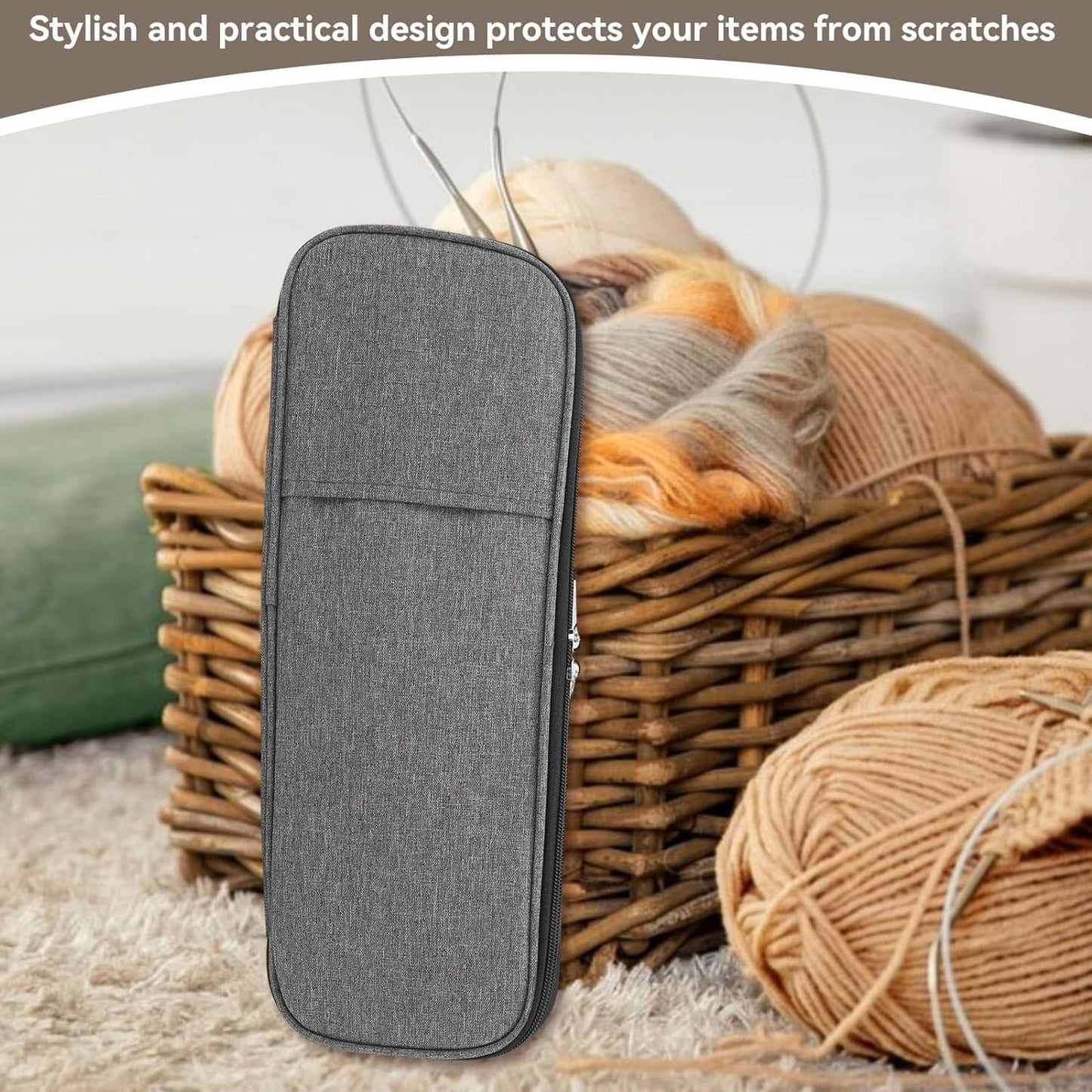 Grey compact needle case standing upright with a zippered front panel