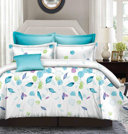 Duvet cover set with white leaf pattern and coordinating blue pillowcases