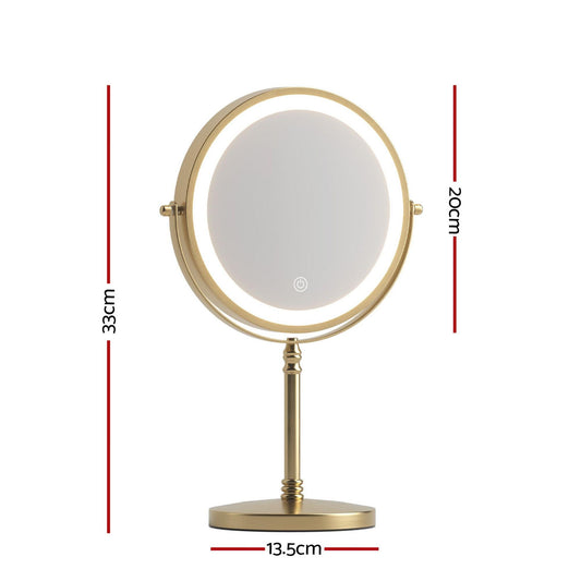 Gold tabletop lighted round makeup mirror with LED ring on a pedestal