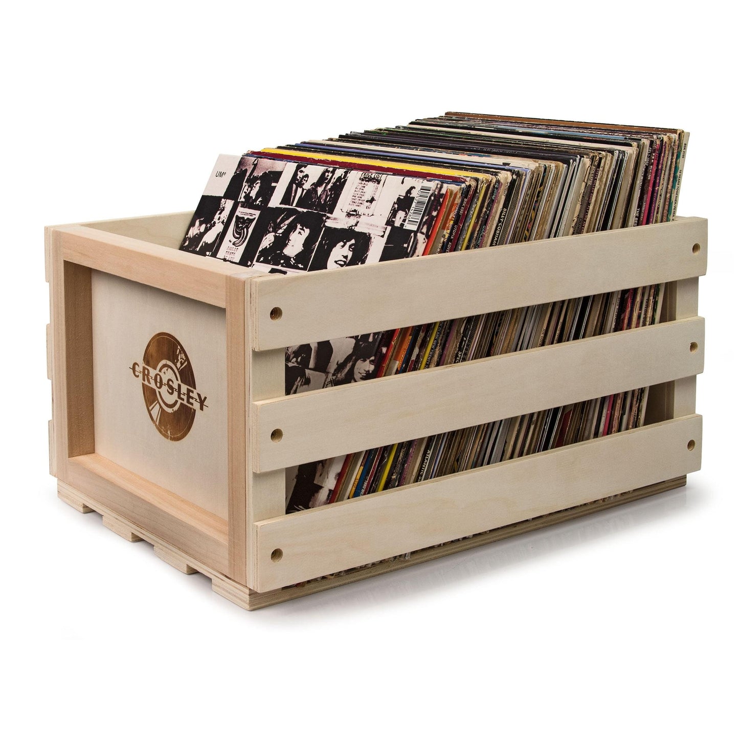 Light wood record crate holding multiple vinyl records with front Crosley badge