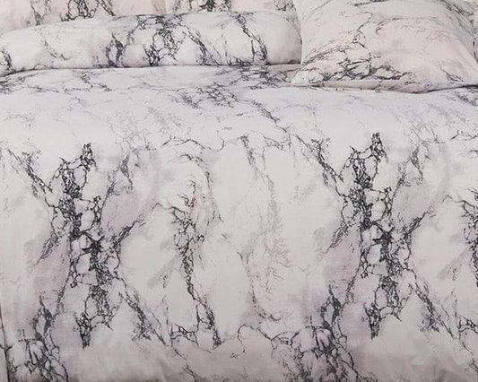 Marble veining duvet cover fabric close-up, white base with dark grey lines