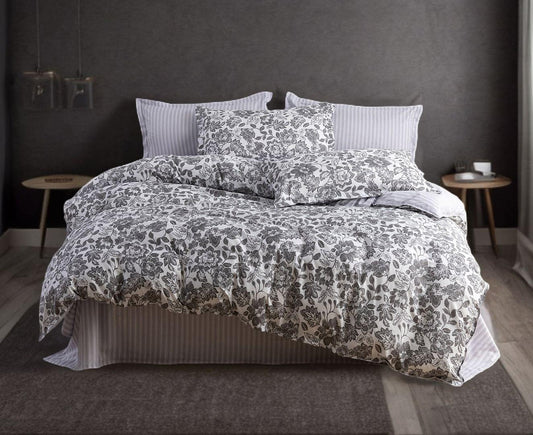 Super king quilt cover set with grey floral pattern and vertical stripe panels on bed