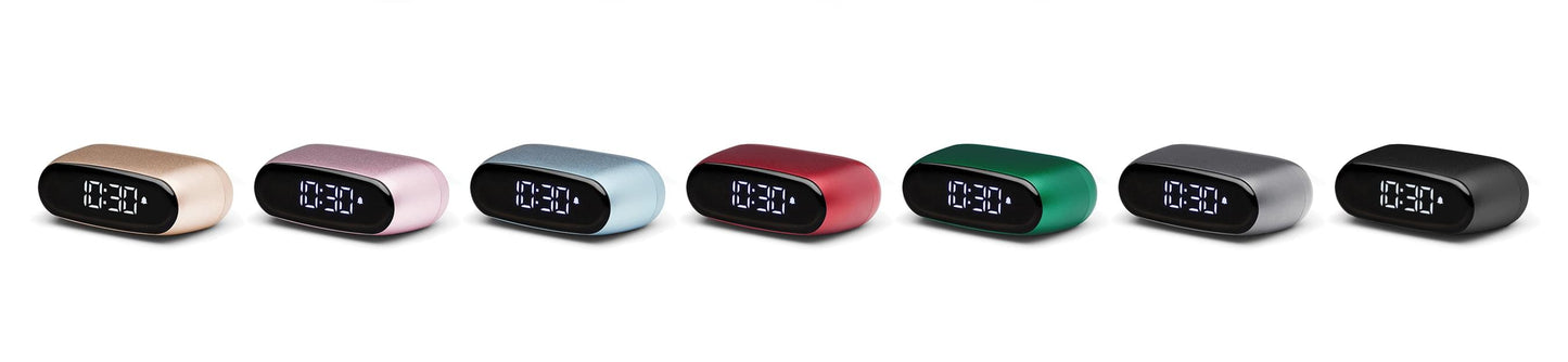 Mini alarm clocks in multiple colors, oval body with digital time display
