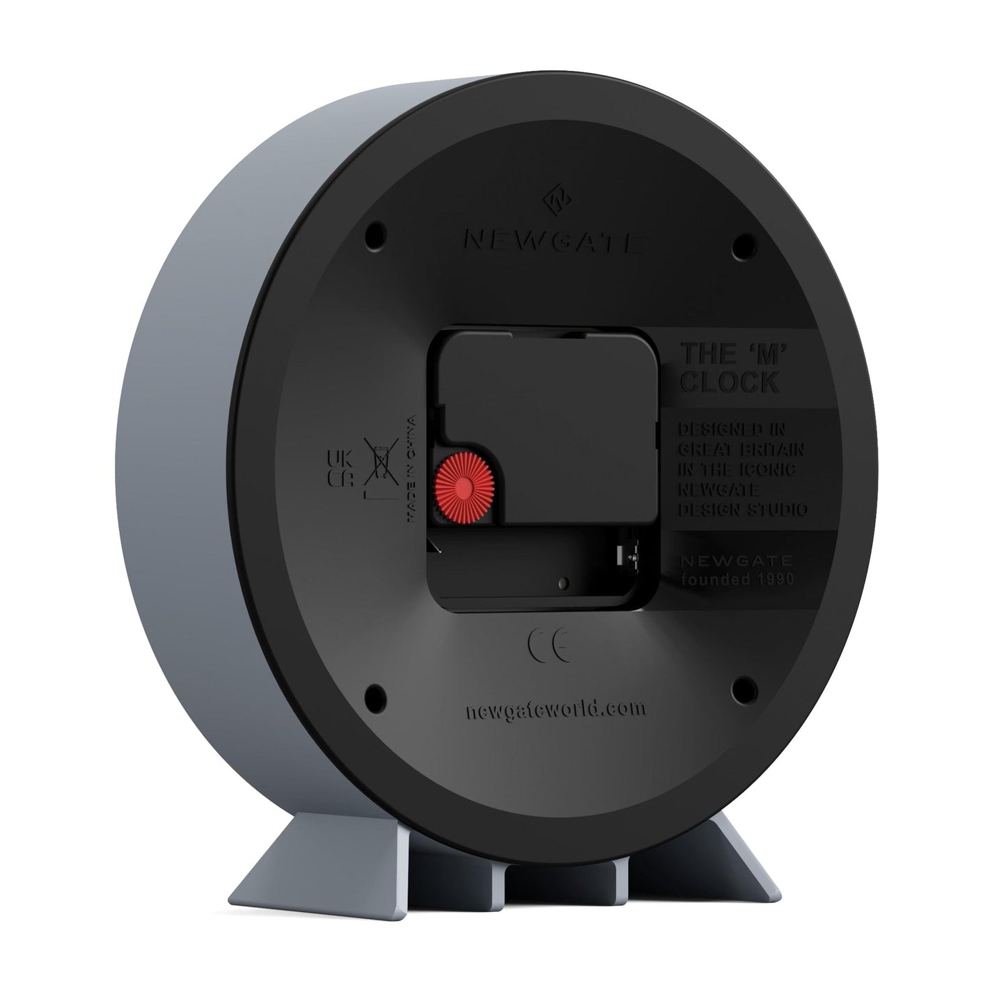 Newgate mantel clock back, round case with wall-mount hardware and label text