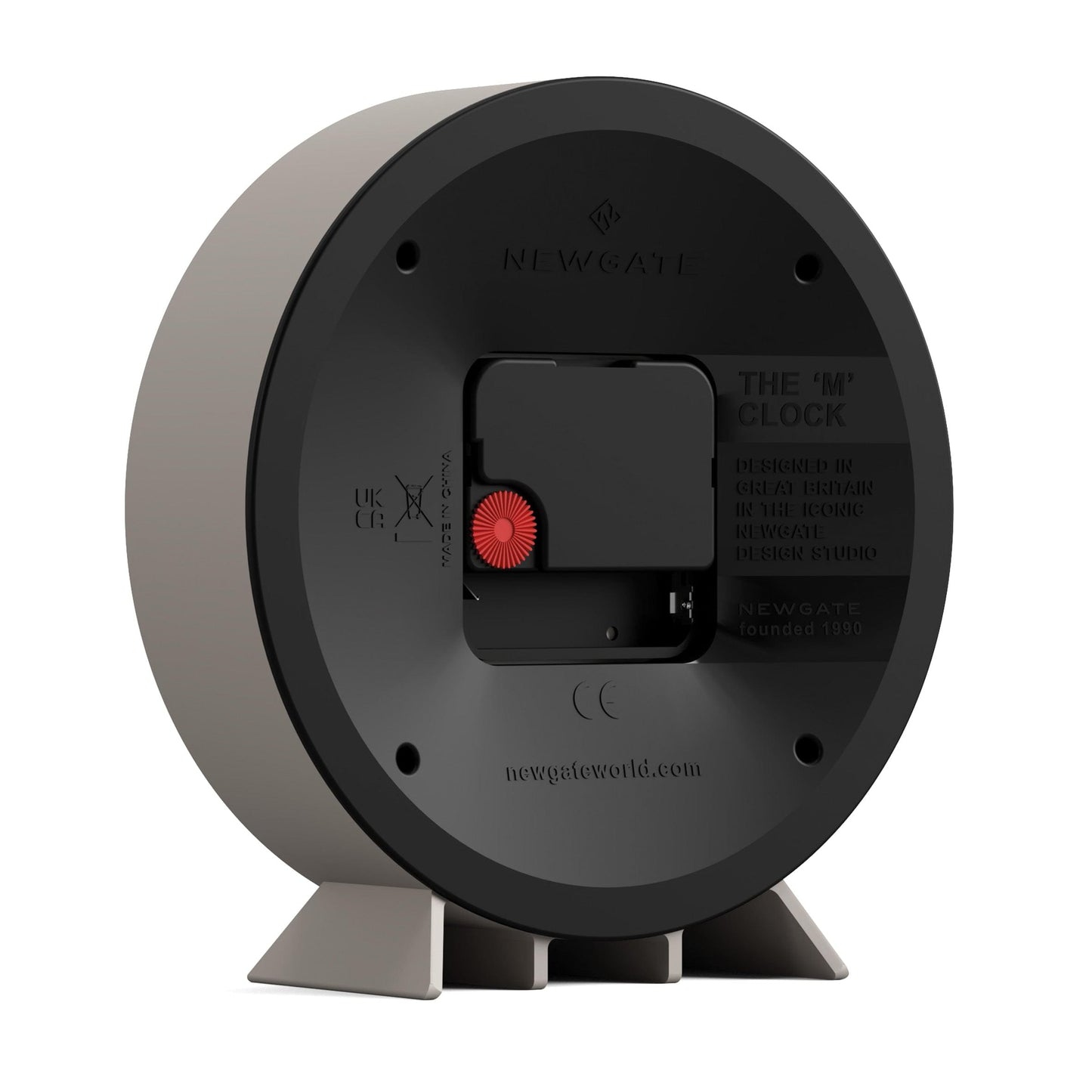 Back view of Newgate mantel clock with dark round housing and stand