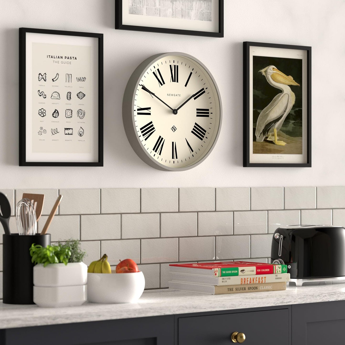Wall clock with gray rim, cream dial, Roman numerals and minute track in black