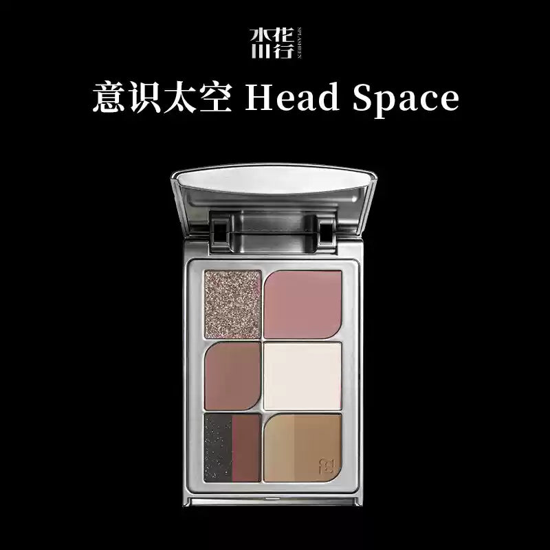 Compact face palette with four nude and two shimmer pans in warm taupe tones
