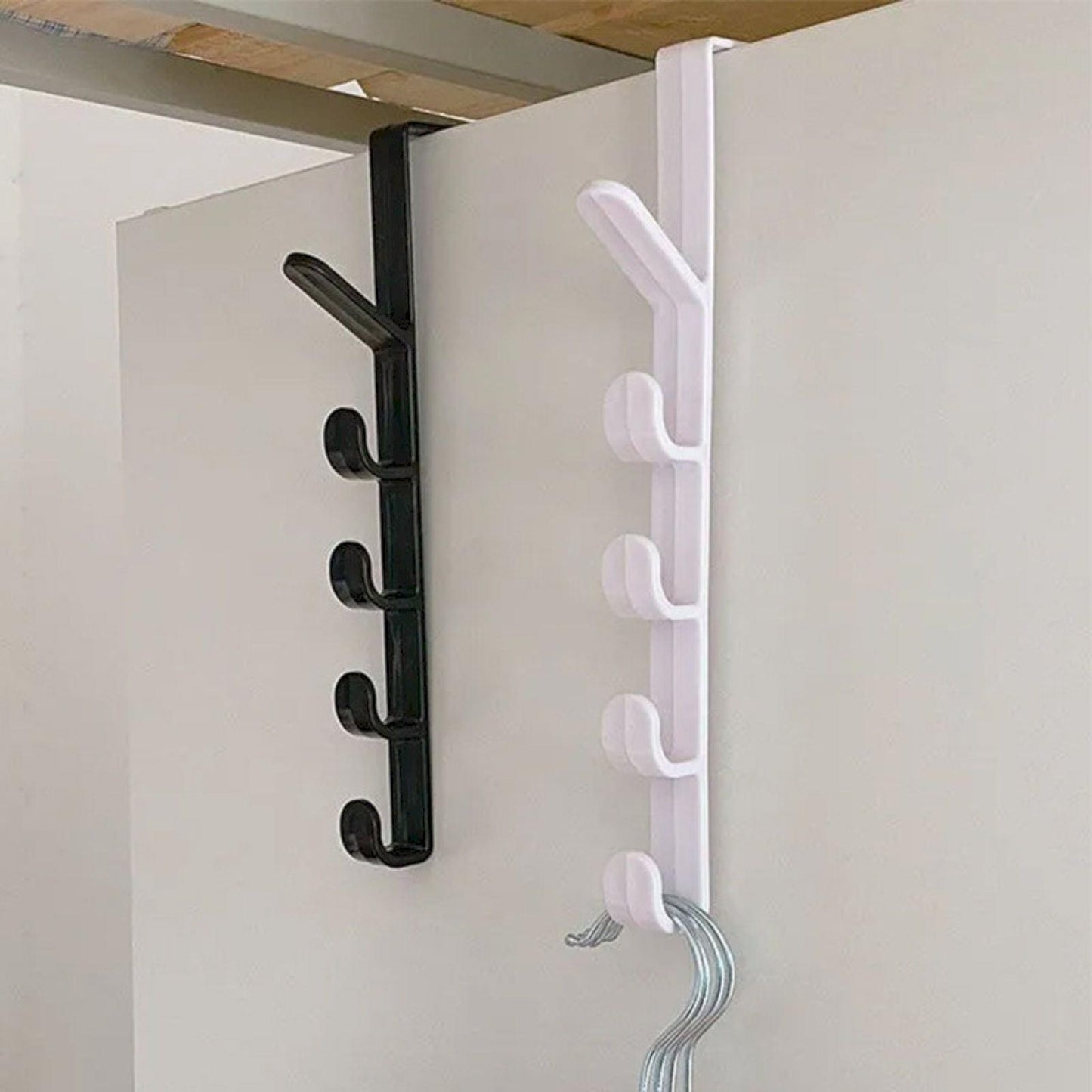 White over-the-door hook organizer with curved hooks and a hanging wire loop