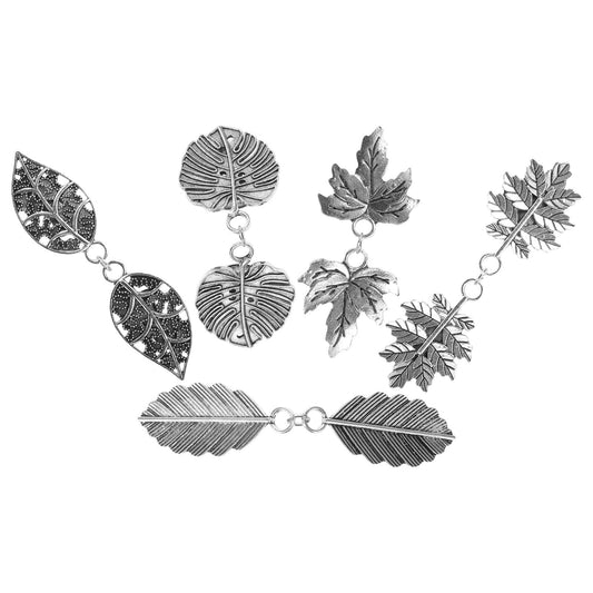 Five silver leaf-shaped sweater clips with decorative barrette ends and links
