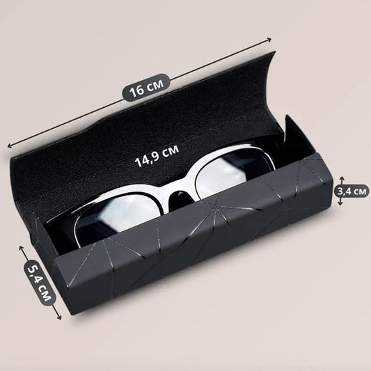 Open black eyeglass case with geometric exterior and soft lined interior