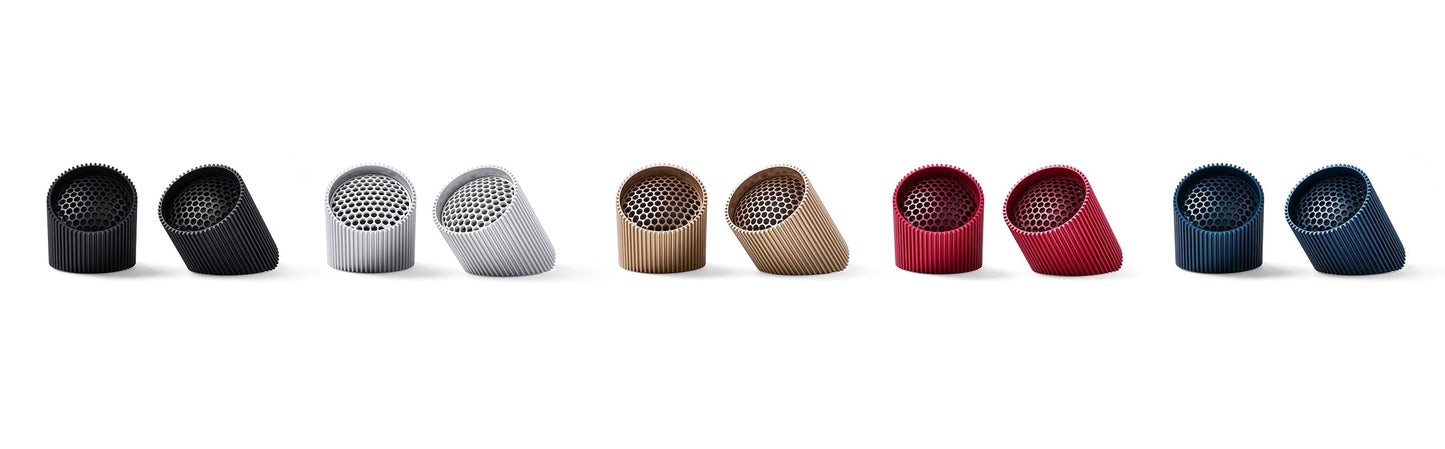 Bluetooth speaker set color lineup: black, gray, tan, red, and blue pairs