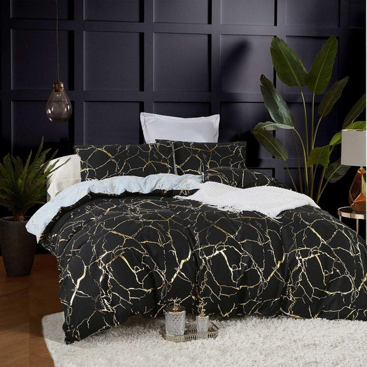 Reversible black duvet quilt cover set with gold marble line motif and matching pillowcases