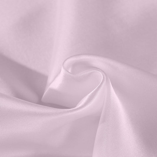 Lilac silk pillow case fabric with smooth sheen and folded seam detail