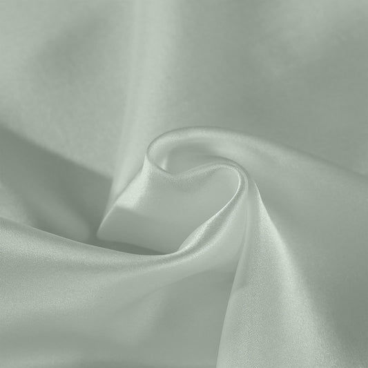Sage silk pillowcase fabric close-up with silky texture