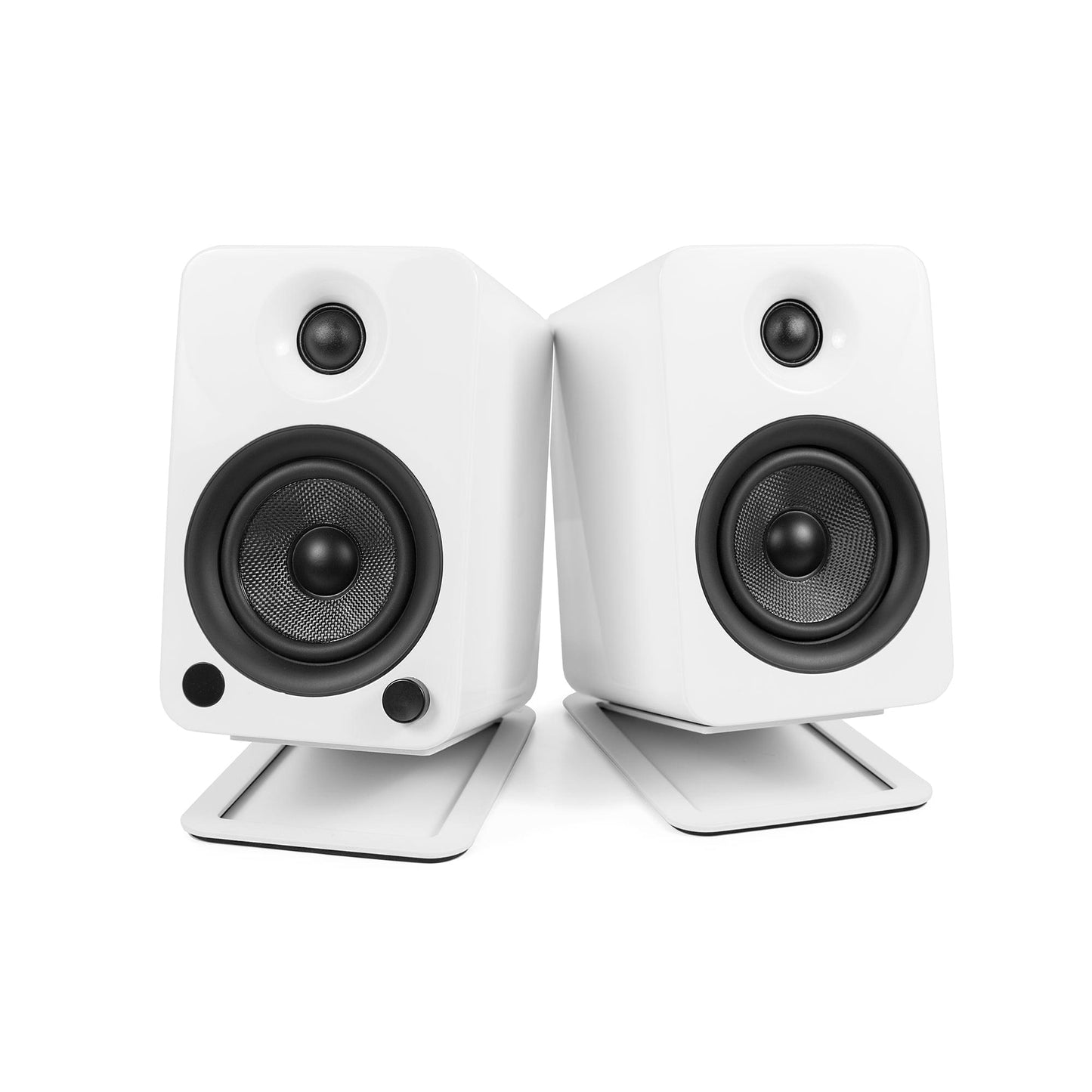 Pair of white desktop speaker stands holding speakers with round black drivers