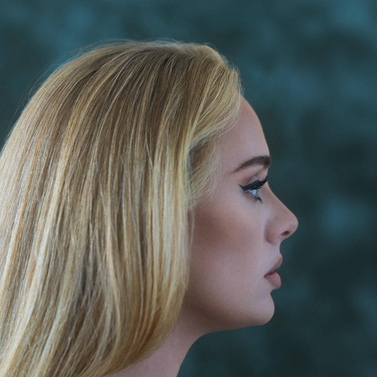Music album CD cover portrait: side-profile blonde woman with blue eyes