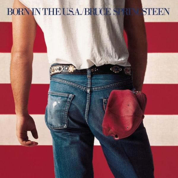 CD album cover featuring blue jeans, studded belt, and red pouch