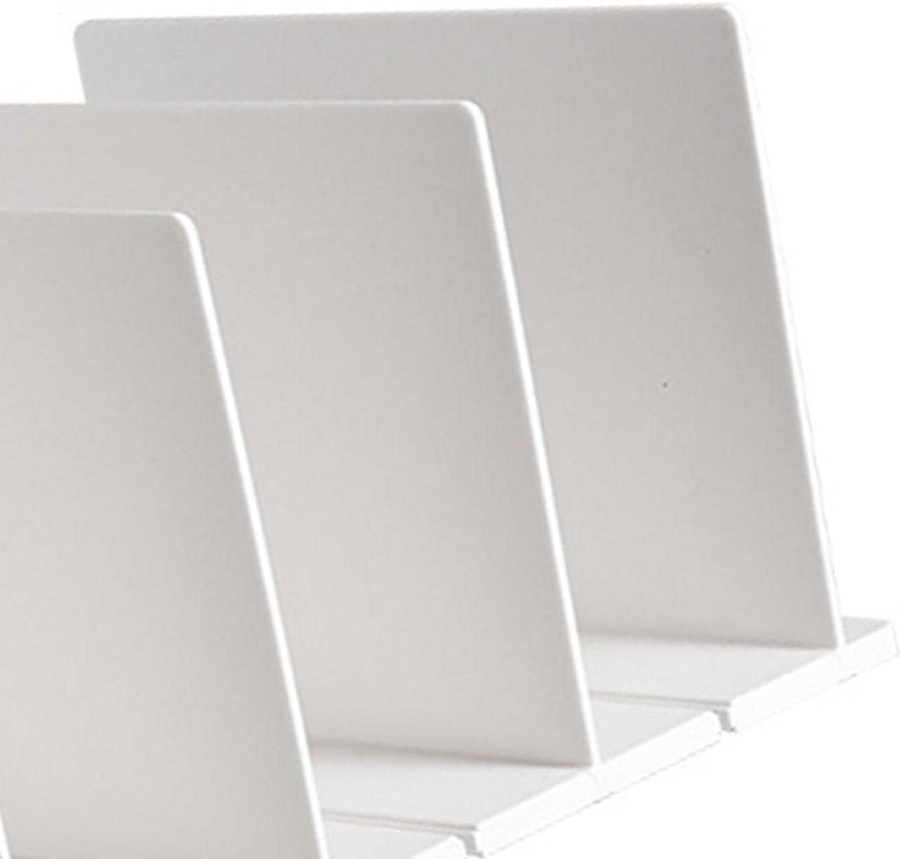 Close-up of white shelf divider partitions with smooth edges and support base