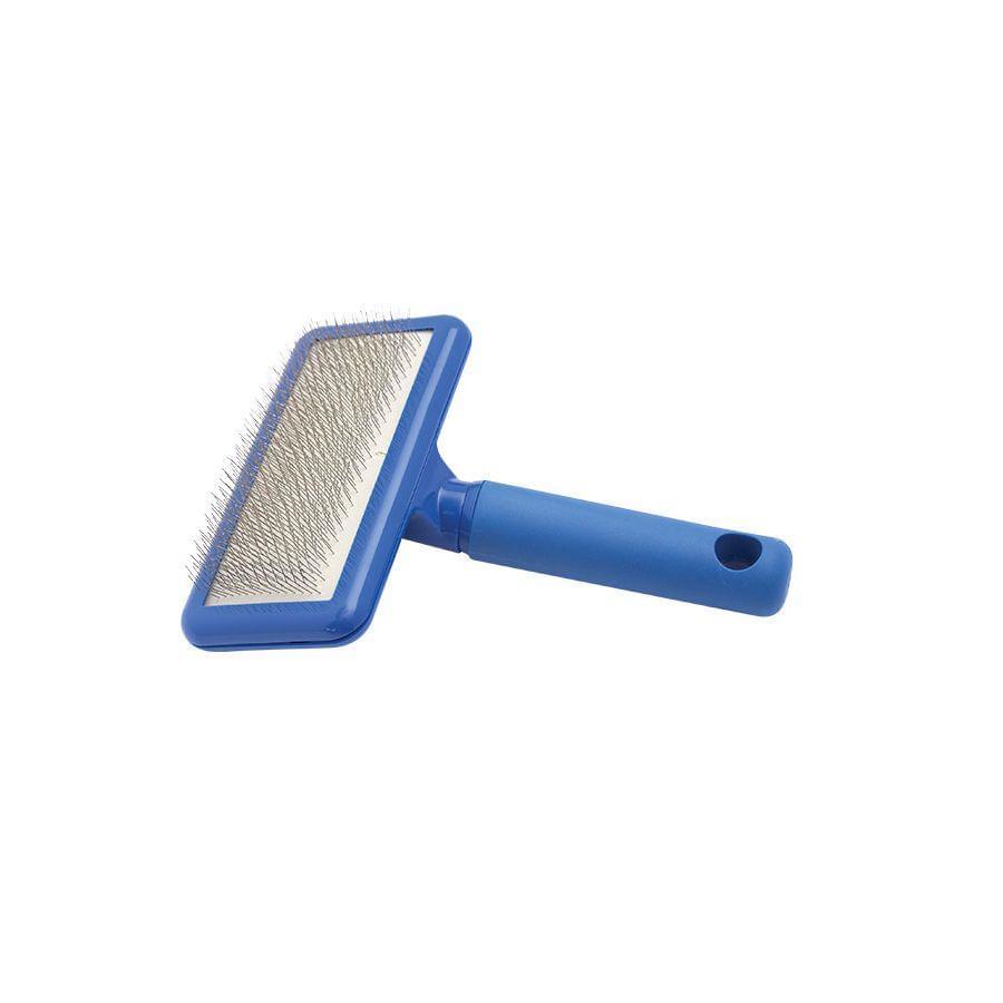 Blue-handled dog slicker brush with angled rectangular grooming pad