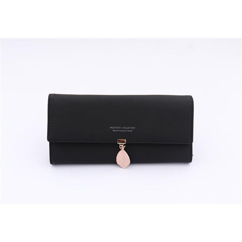 Black front-flap wallet storage bag with clasp and pink heart charm