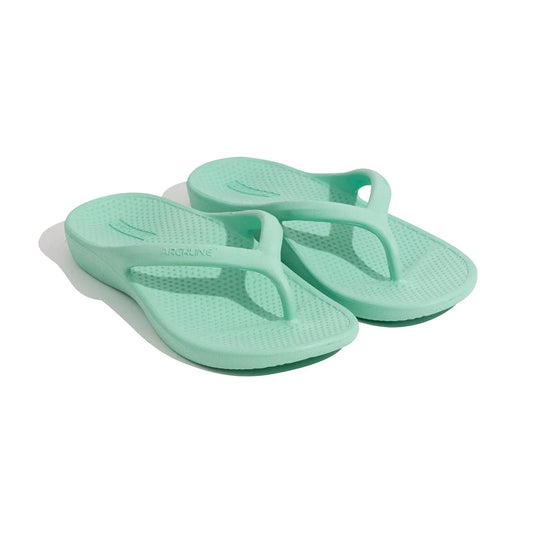 Mint green orthotic thong sandals, angled view showing contoured footbed support