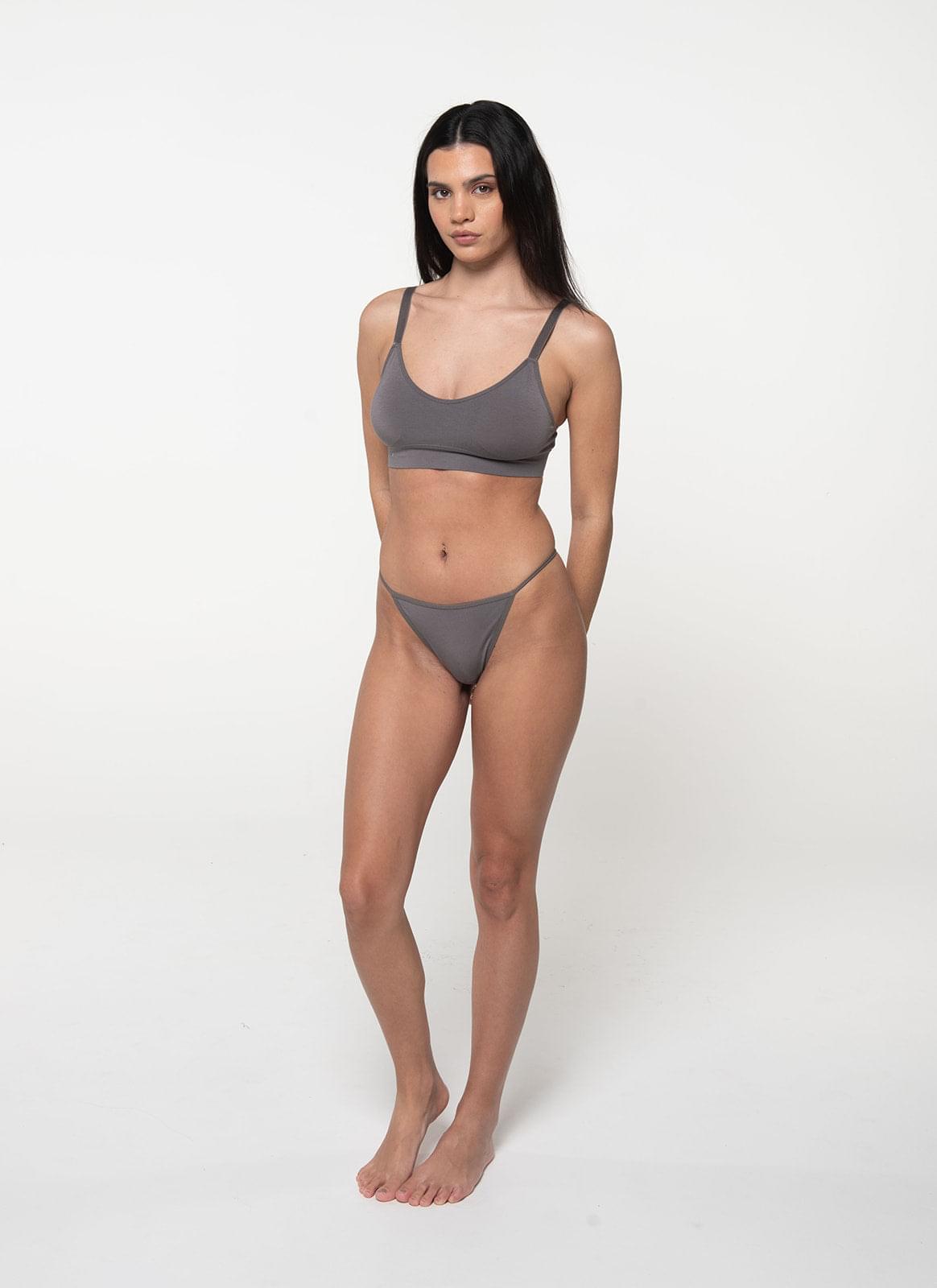 Slate gray G-string thong with thin straps, full body standing view
