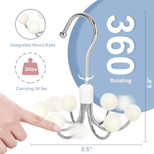 Rotating over-door hook hanger with curved metal arms and white wood balls