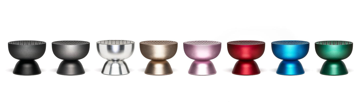 Bluetooth speaker in multiple colors: gunmetal, pink, blue, red and black units shown